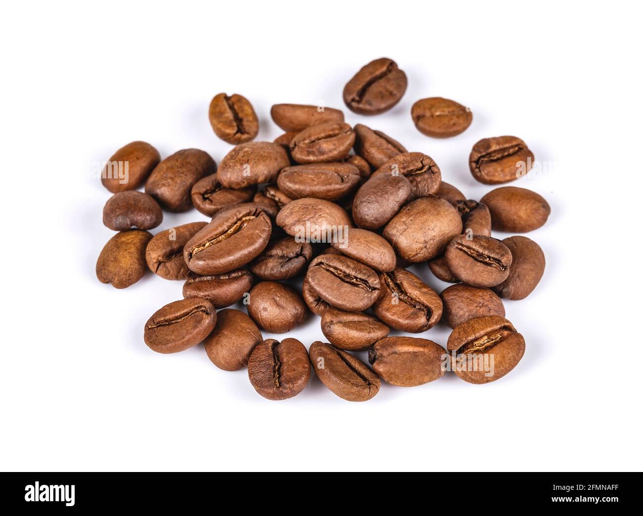 Roasted coffee beans isolated in white background Stock Photo
