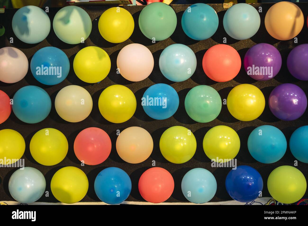 Balls on black background Stock Photo - Alamy