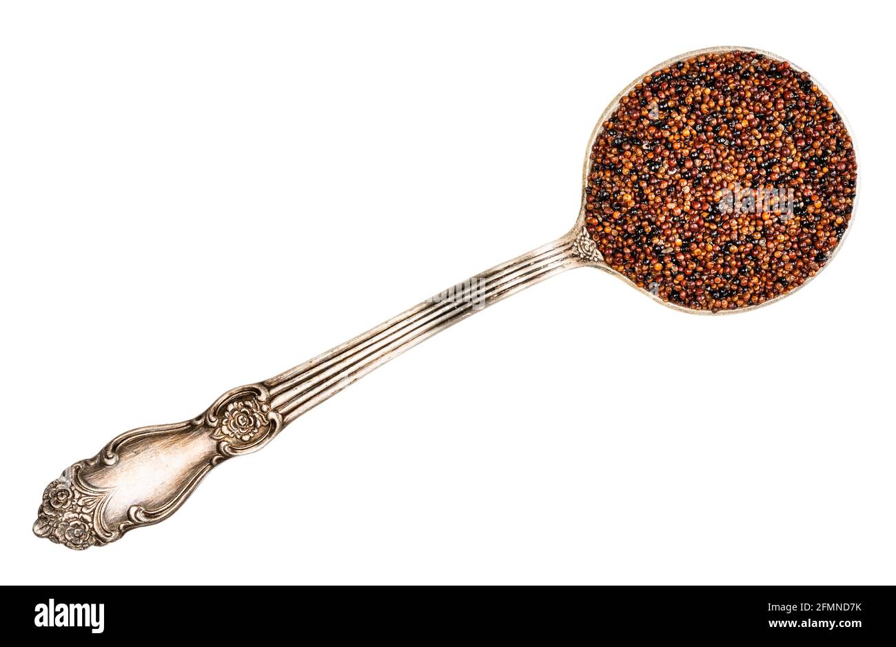 top view of canihua seeds in tablespoon cutout on white background Stock Photo