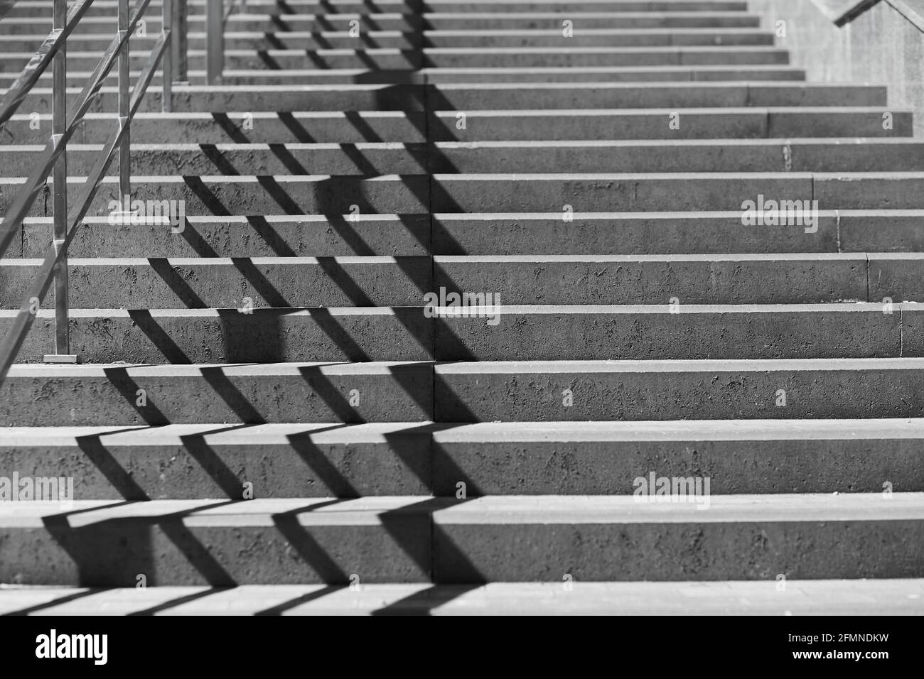 Grey ladder background texture with trendy shadows. Copy space.  Stock Photo