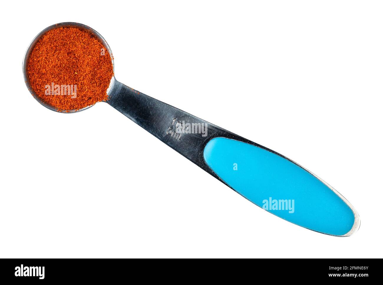 top view of chili powder from cayenne pepper in measuring teaspoon