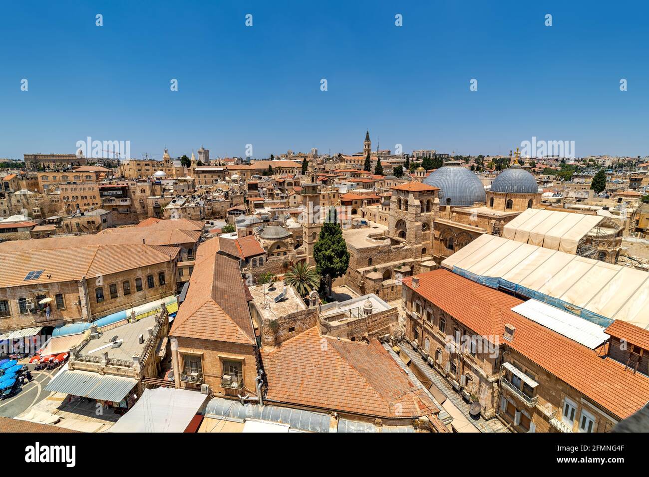 View from above of red roofs, houses, minarets and churches in old city of Jerusalem, Israel. Stock Photo