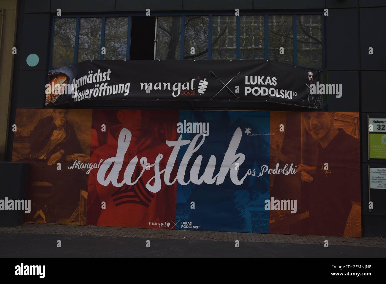 Cologne, Germany. 09th May, 2021. Sign on a shop : Here a new branch of Dostluk Mangal Döner by Lukas Podolski is being built Credit: Horst Galuschka/dpa/Alamy Live News Stock Photo