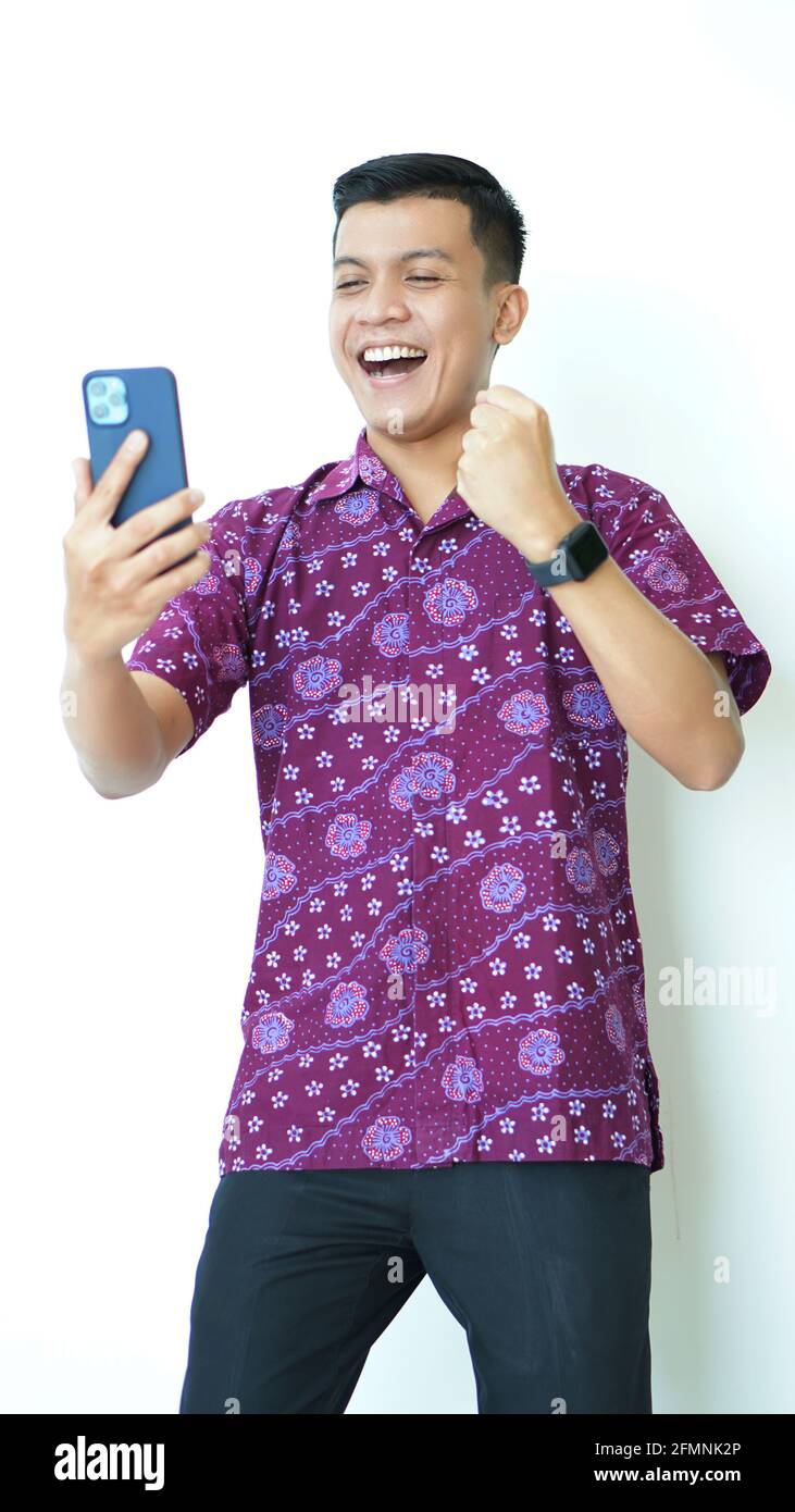 Excited business man holding hi-res stock photography and images - Alamy