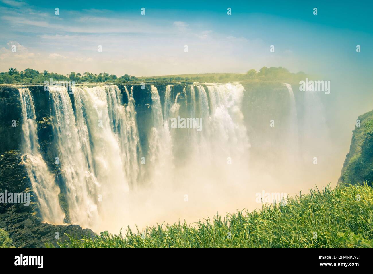 Vintage postcard of Victoria Waterfalls - Natural wonder of Zimbabwe - Continent of Africa Stock Photo