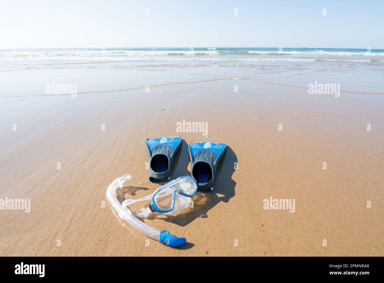 diving and snorkeling equipment on the sand of the beach. fins, mask and snorkel. leisure and water sports concept Stock Photo
