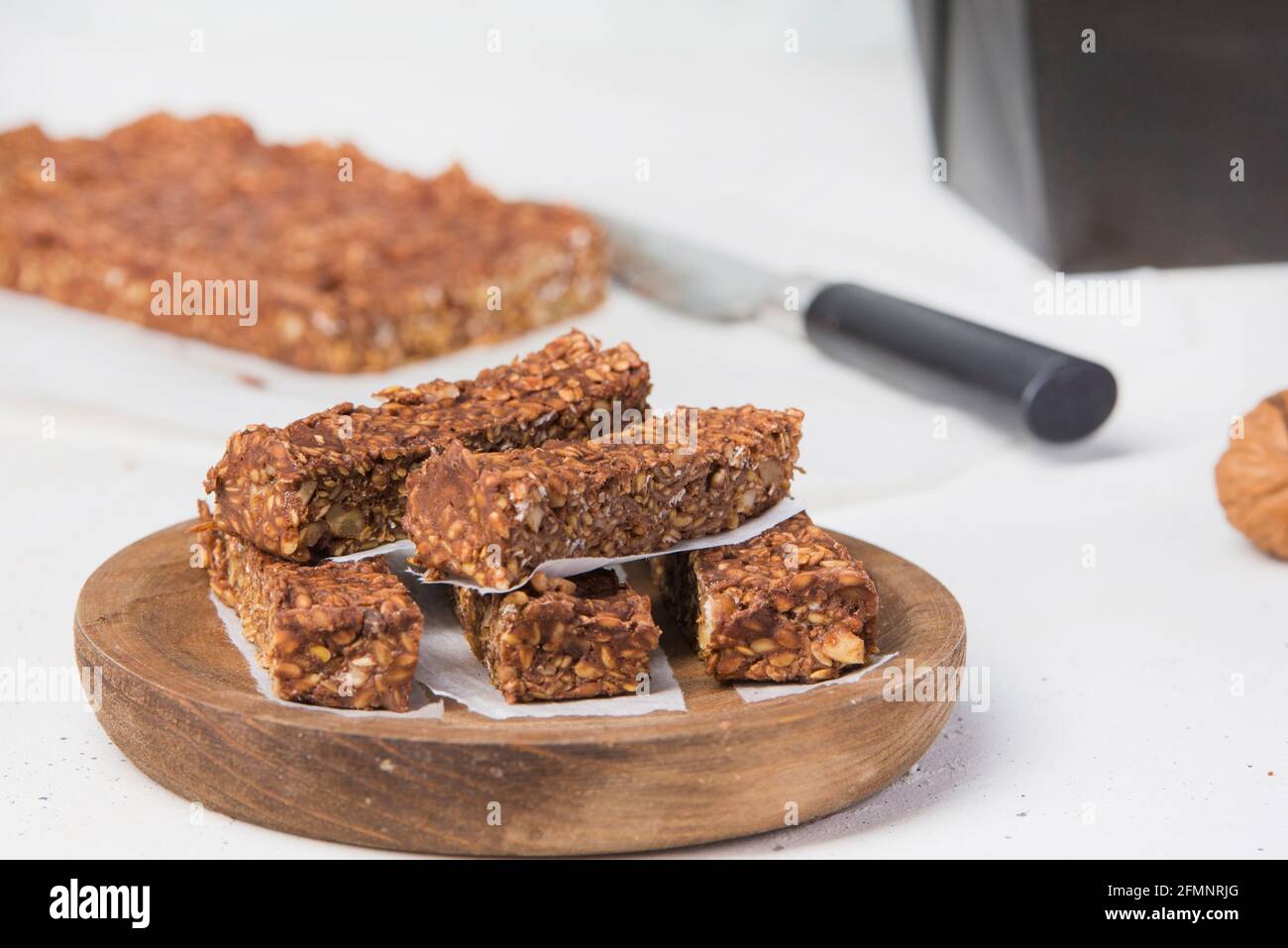bar with chocolate protein and unsweetened nuts Stock Photo Alamy