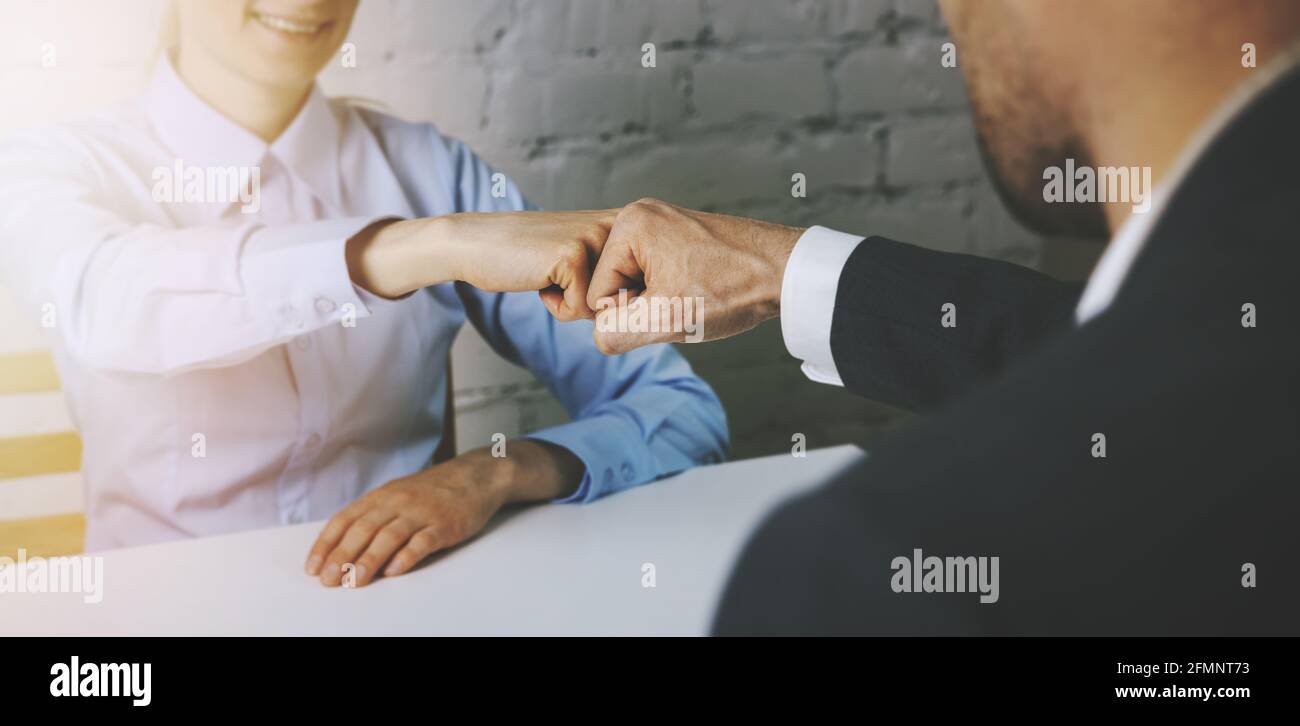 business people fist bump after successful agreement. teamwork and businessmen partnership concept Stock Photo