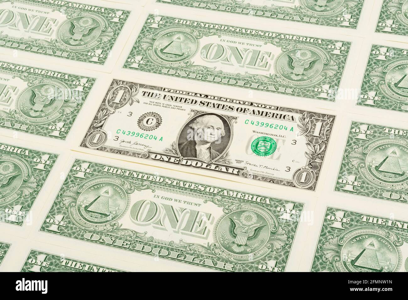 Reverse & Obverse sides of US $1 / one dollar bills arranged in formation. For US trillion $ debt mountain, US personal savings & 401k, US bank crisis Stock Photo