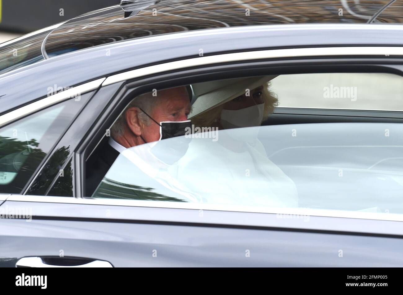 Westminster London, UK. 11th May, 2021. Prince Charles and Camilla Duchess of Cornwall arrive at Westminster where Queen Elizabeth ll will deliver the QueenÕs Speech in the House of Lords to mark the State opening of Parliament. Credit: MARTIN DALTON/Alamy Live News Stock Photo