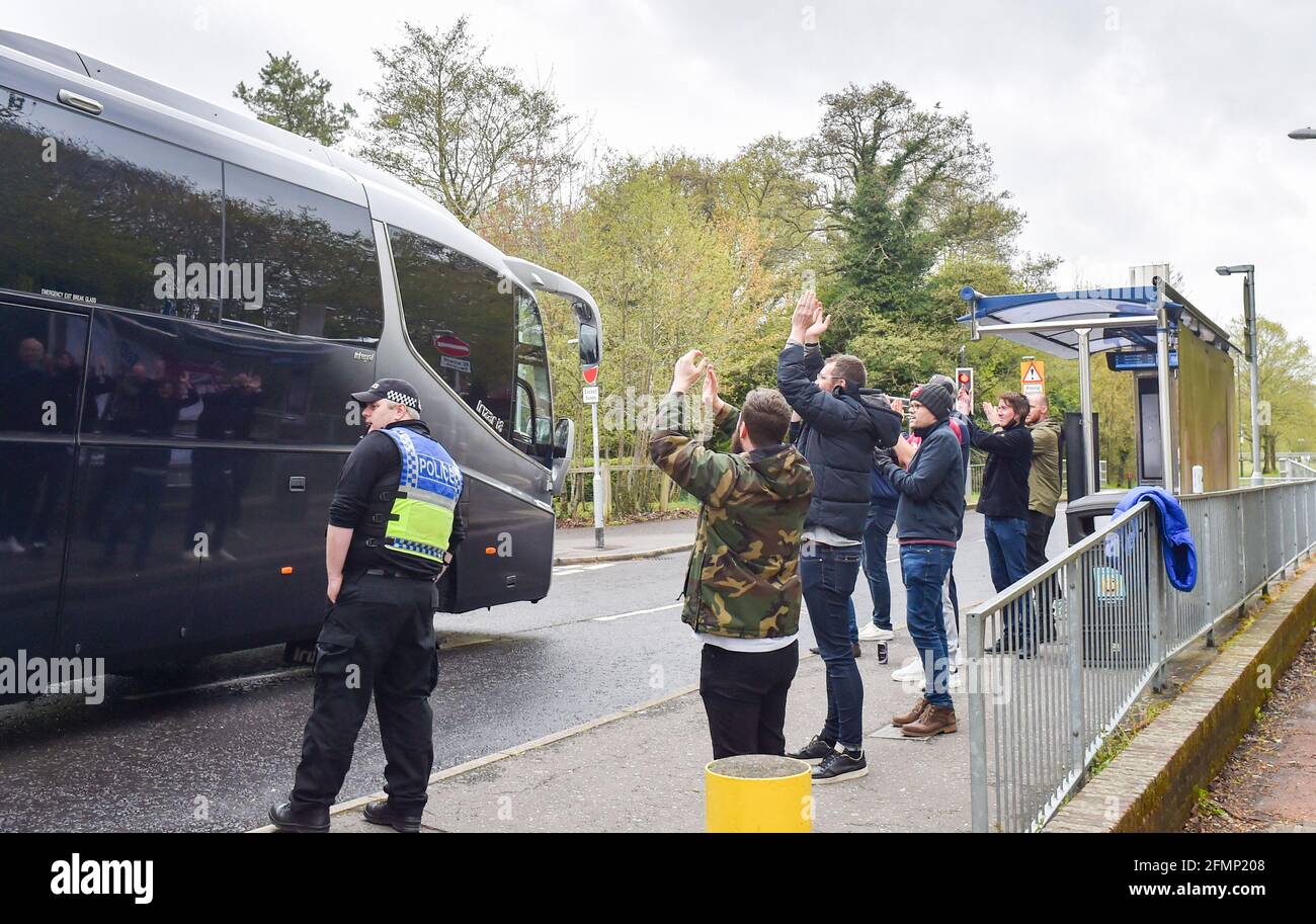 Bolton fans applaud their team as they arrive for the Sky Bet League Two match between Crawley Town and Bolton Wanderers at the People's Pension Stadium  , Crawley ,  UK - 8th May 2021 - Editorial Use Only Stock Photo