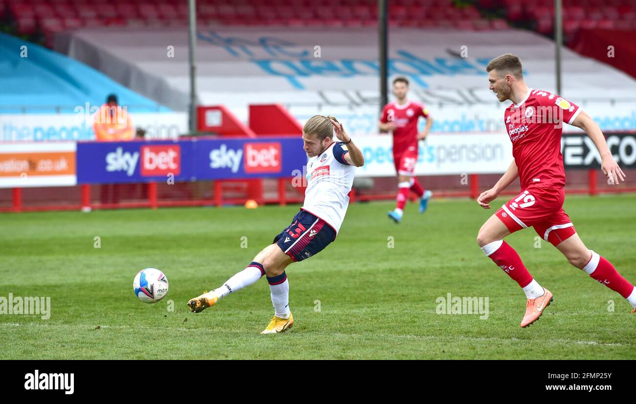 Lloyd Isgrove of Bolton breaks away to score their fourth goal during the Sky Bet League Two match between Crawley Town and Bolton Wanderers at the People's Pension Stadium  , Crawley ,  UK - 8th May 2021 - EDITORIAL USE ONLY No use with unauthorised audio, video, data, fixture lists, club/league logos or “live” services. Online in-match use limited to 120 images, no video emulation. No use in betting, games or single club/league/player publications Stock Photo