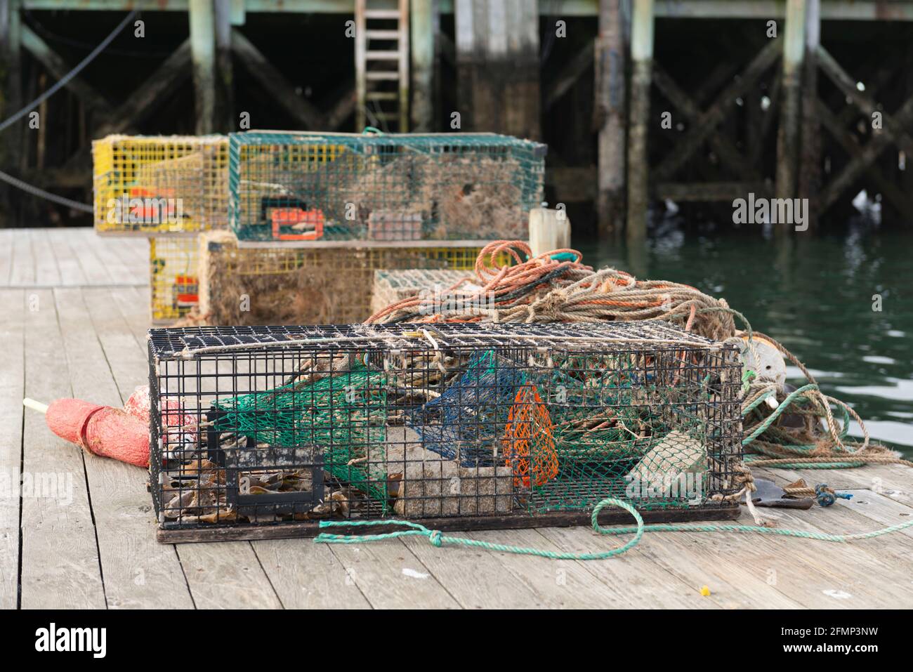 Lobster Traps on the Dock at Tremont Harbor, Bernard, on Mt Desert Island, Maine Stock Photo