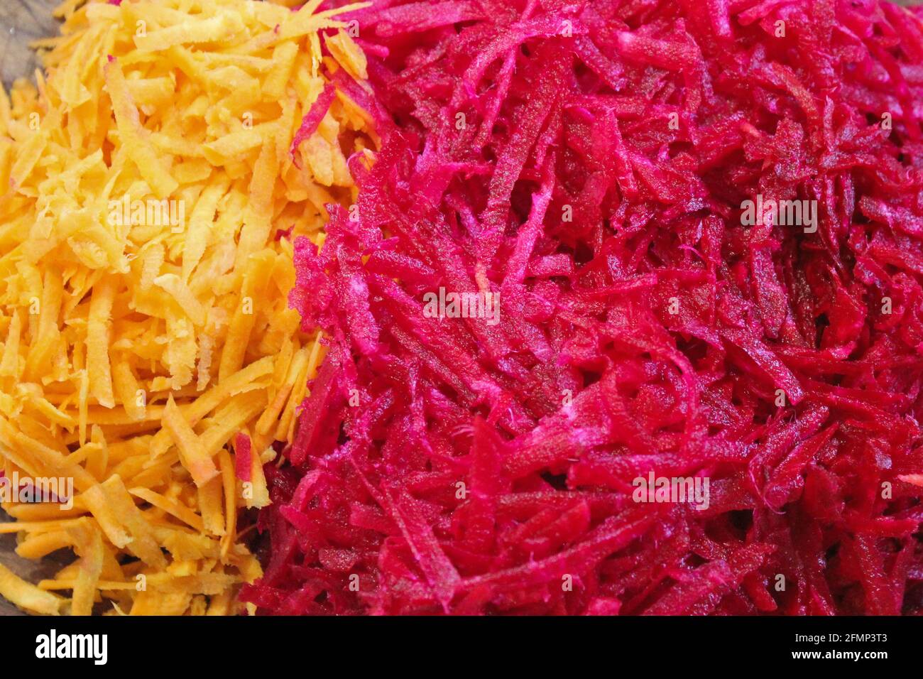 Grated beets and carrots Stock Photo