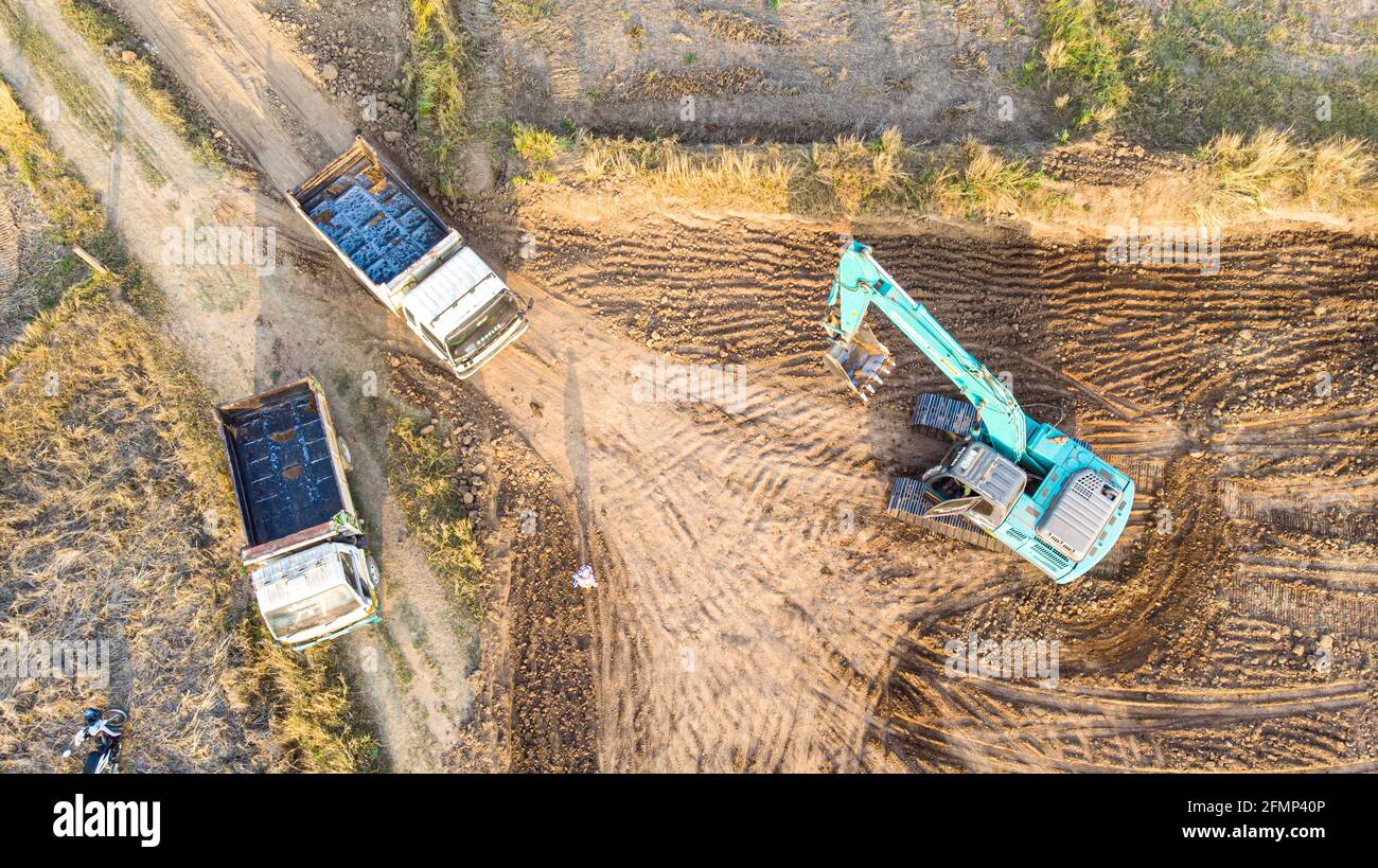 Excavator working on construction site Stock Photo - Alamy