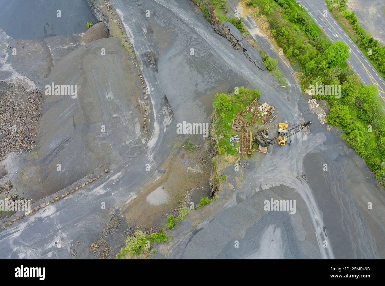 Drone aerial view of opencast mining quarry in the middle of the ...