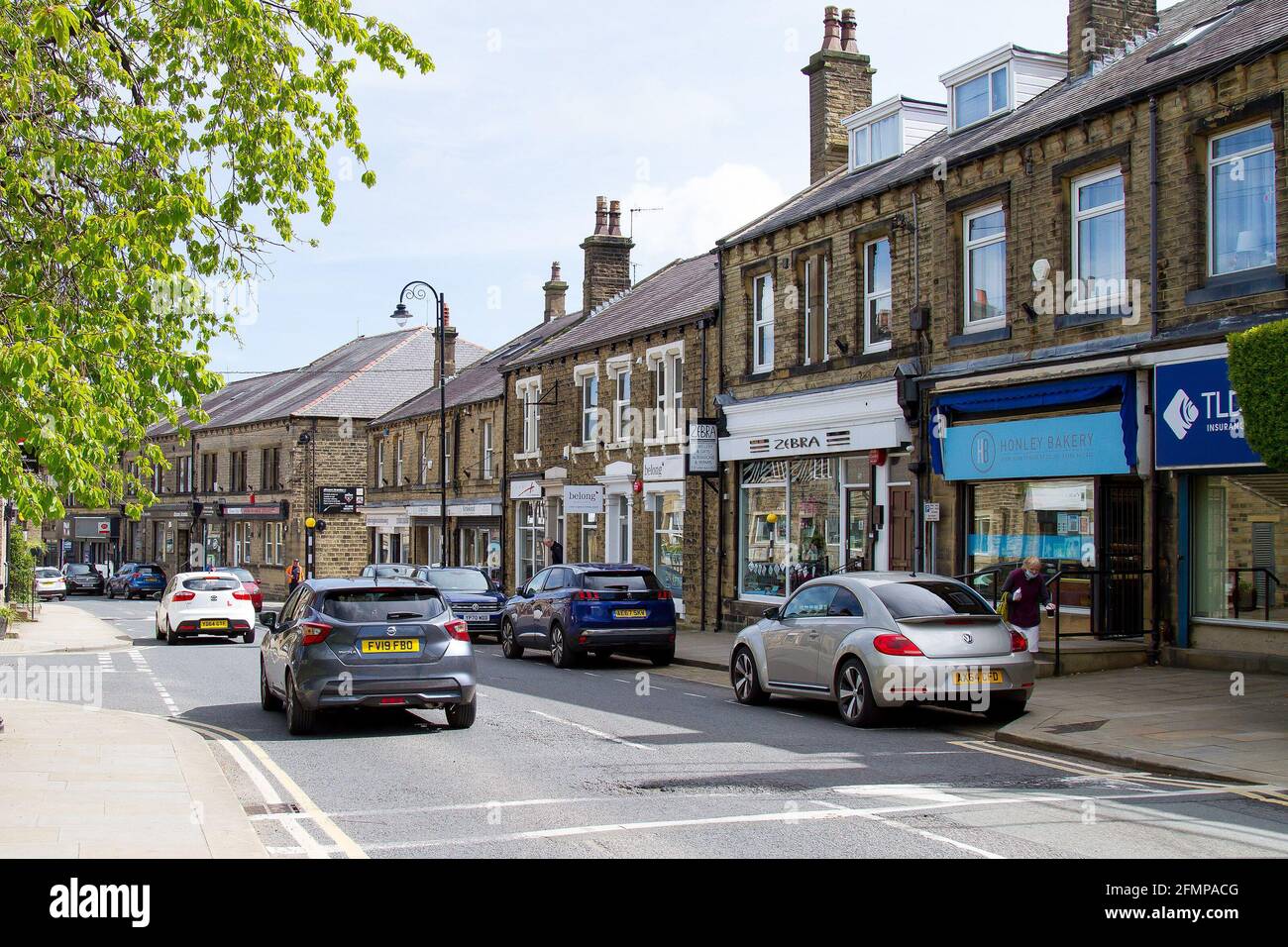 Honley traffic passing through Honley village (near Holmfirth Stock Photo - Alamy