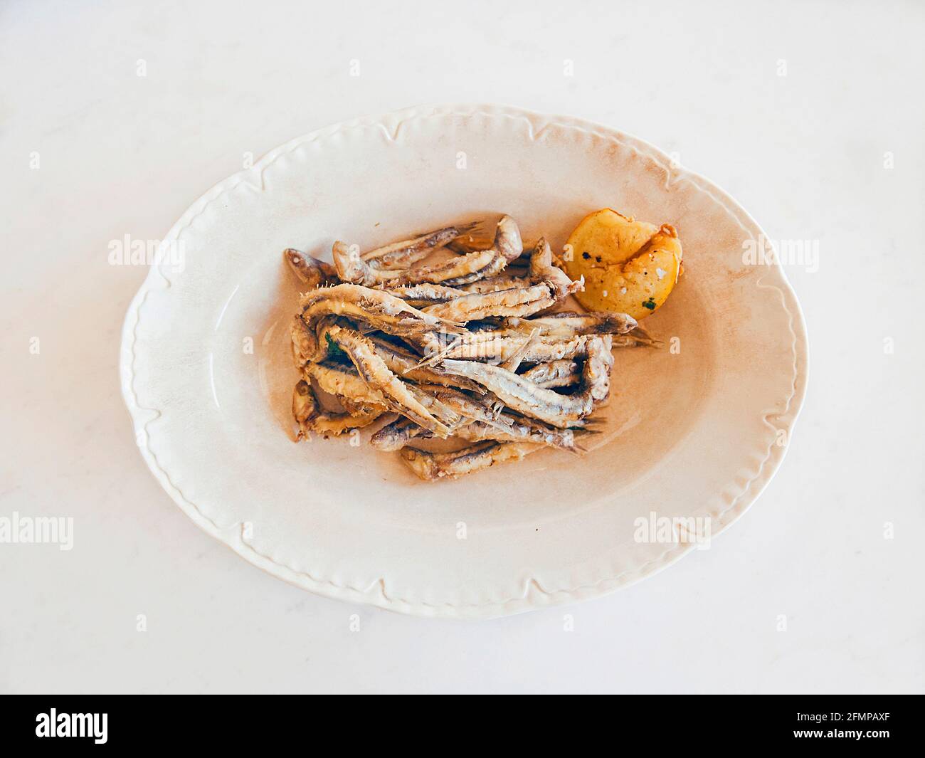 Fried anchovies in an old English porcelain plate, Cetara, Amalfi Coast