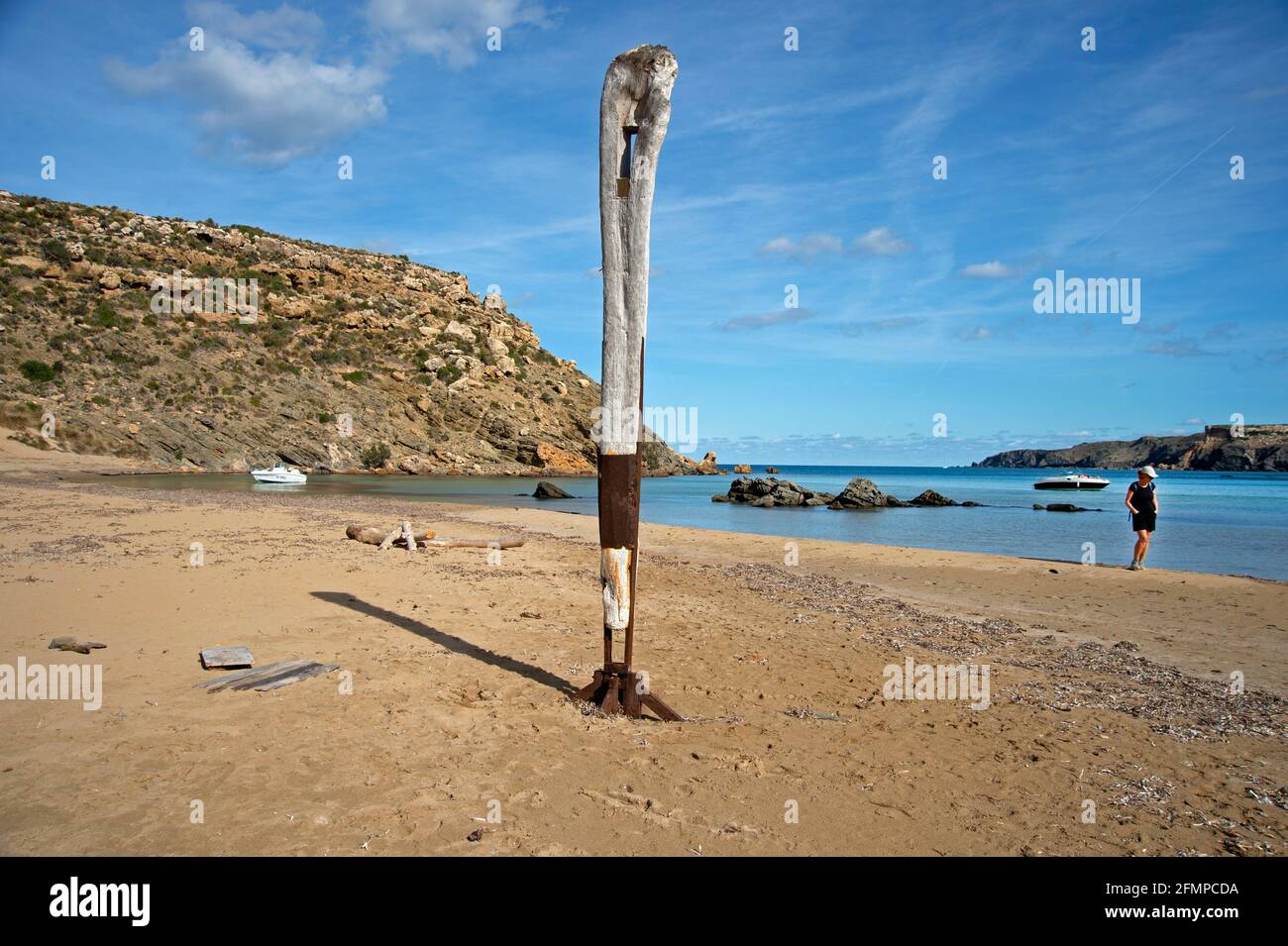 The needle sculpture on mongofre beach menorca spain Stock Photo