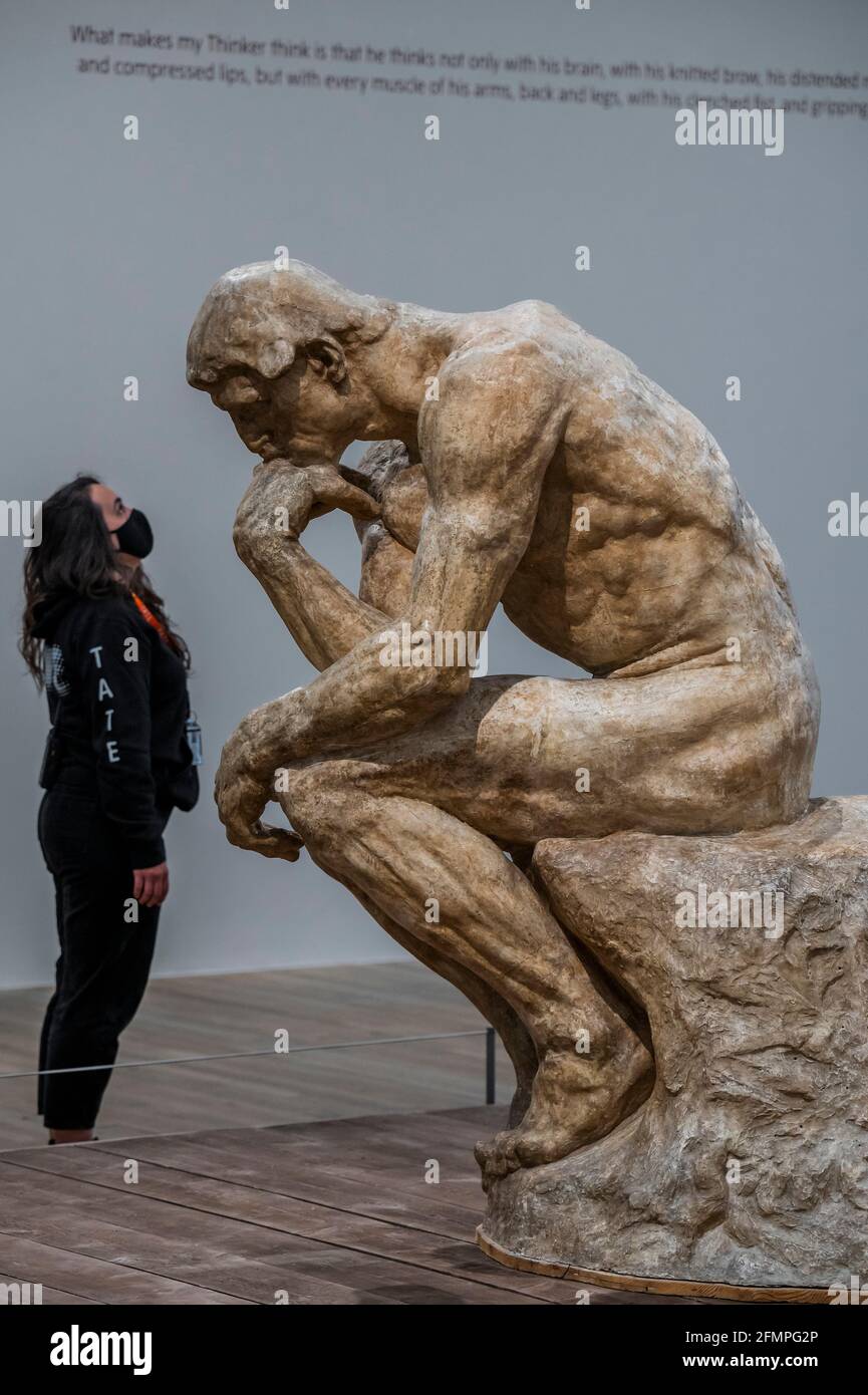 London, UK. 11th May, 2021. The EY Exhibition: The Making of Rodin preview at the Tate Modern. The gallery will reopen, after the latest covid lockdown, with this new exhibition of the works of Aguste Rodin (1840-1917). It shows how he broke the rules of classical sculpture to create a different image of the human body, 'mirroring the ruptures, complexities and uncertainties of the modern age'. Featuring over 200 works, the exhibition is partly thanks to a unique collaboration with the Musée Rodin. Credit: Guy Bell/Alamy Live News Stock Photo