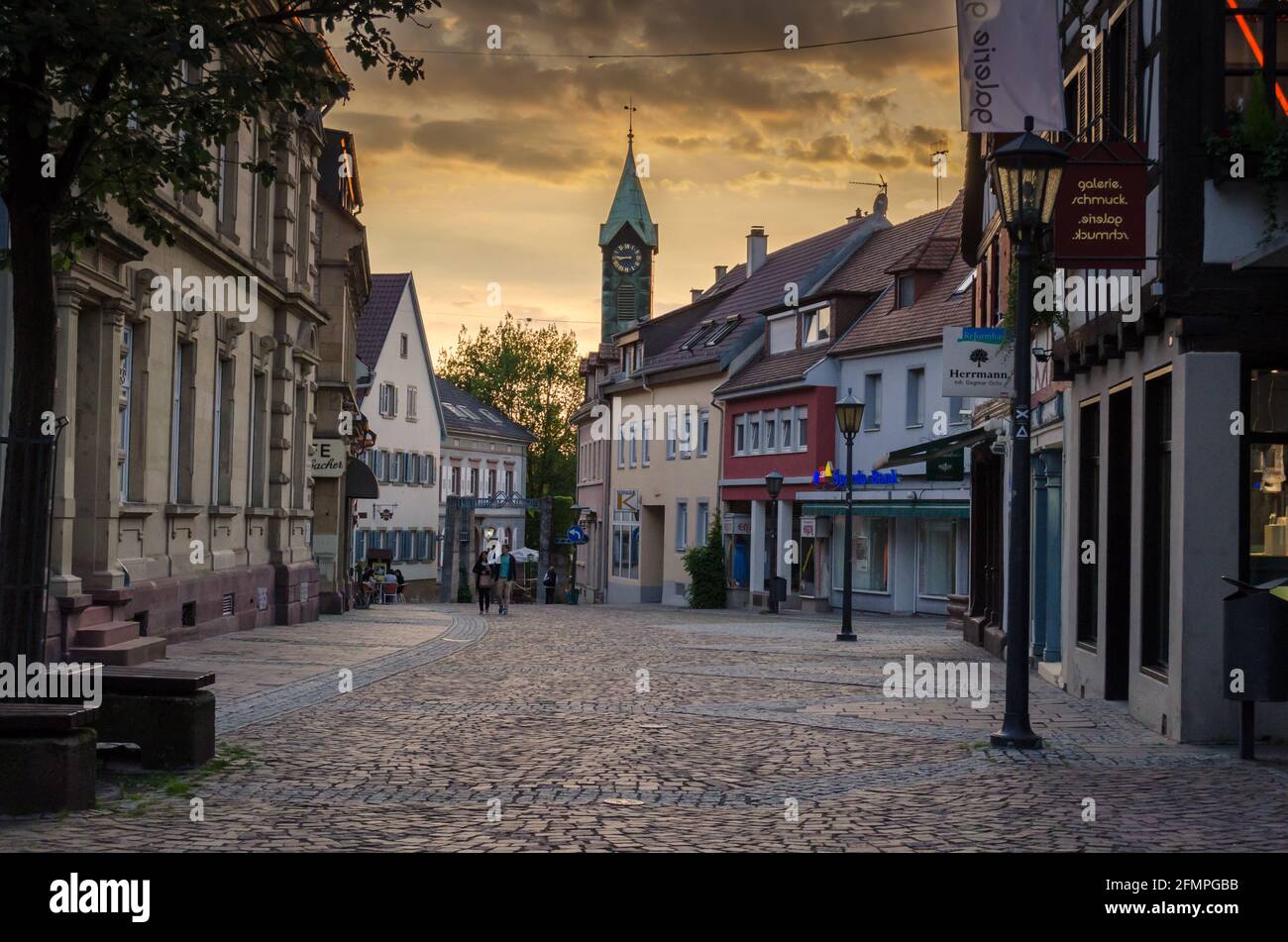 BRETTEN, GERMANY - Apr 18, 2021: Beautiful sunset light illuminating the old part of Bretten town in Germany. Stock Photo