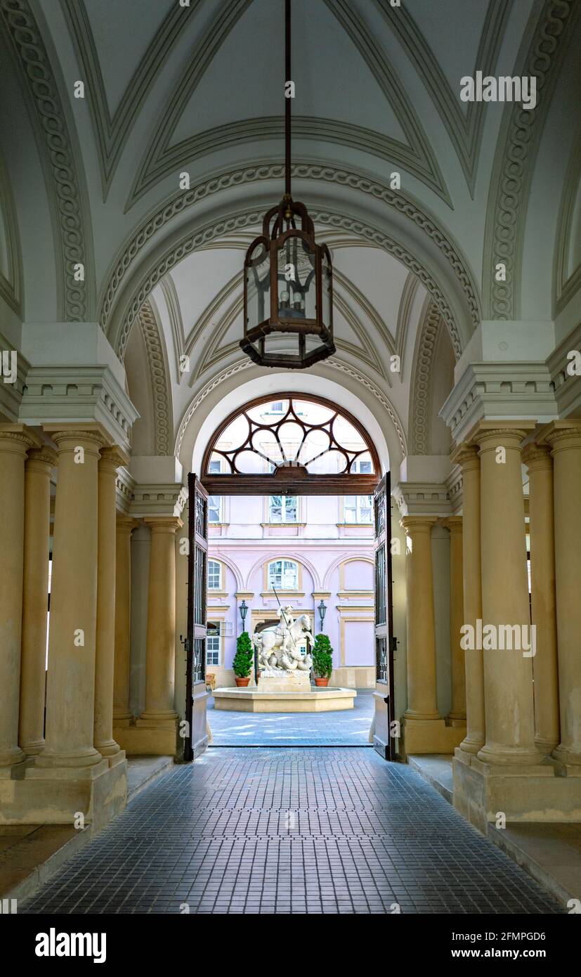 Bratislava, Slovakia, the columns and ceiling decorations of the Primate Palace entrance Stock Photo