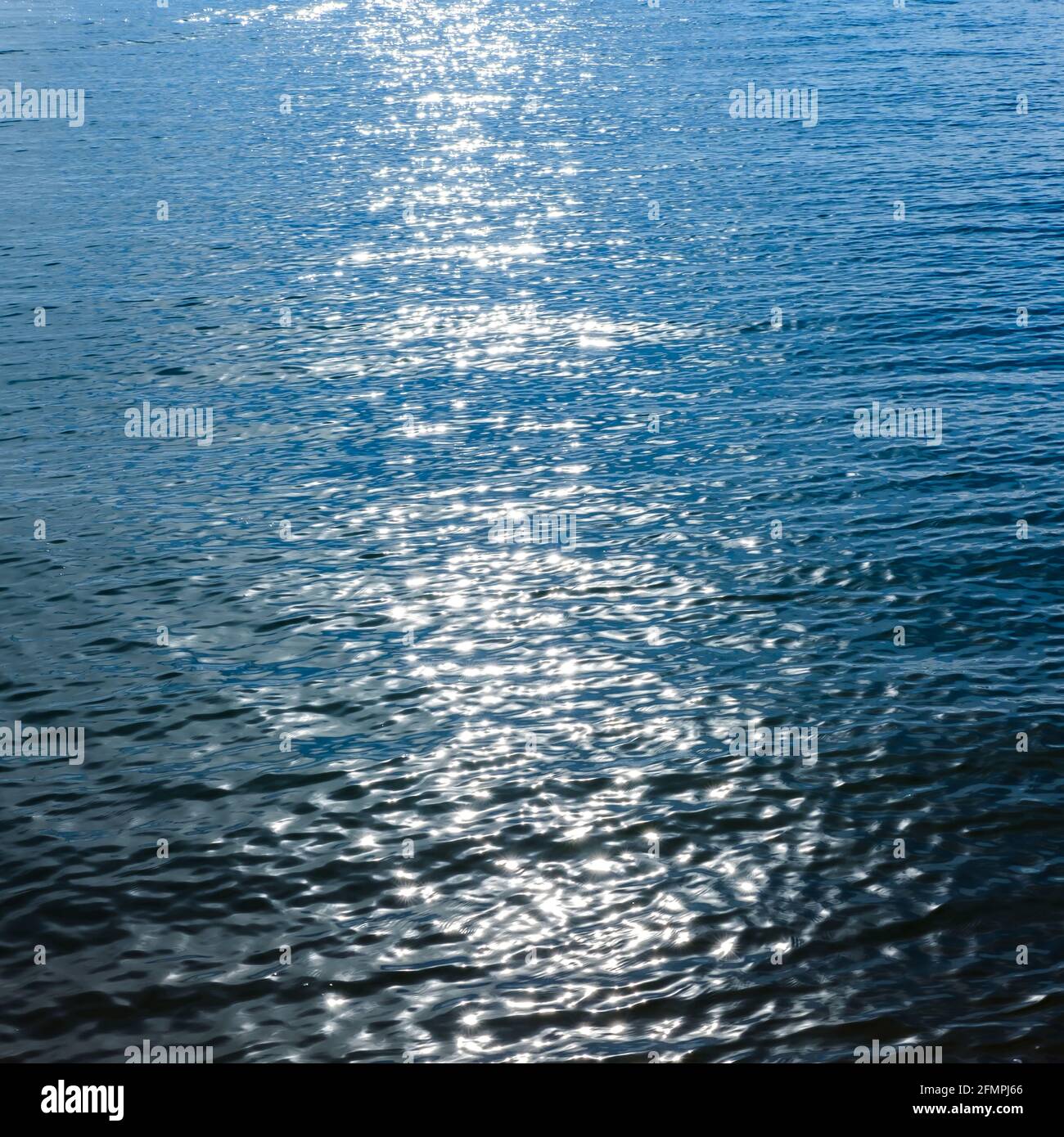 Reflective Ocean Reflection of ocean waves in the evening, dark ocean background Stock ...