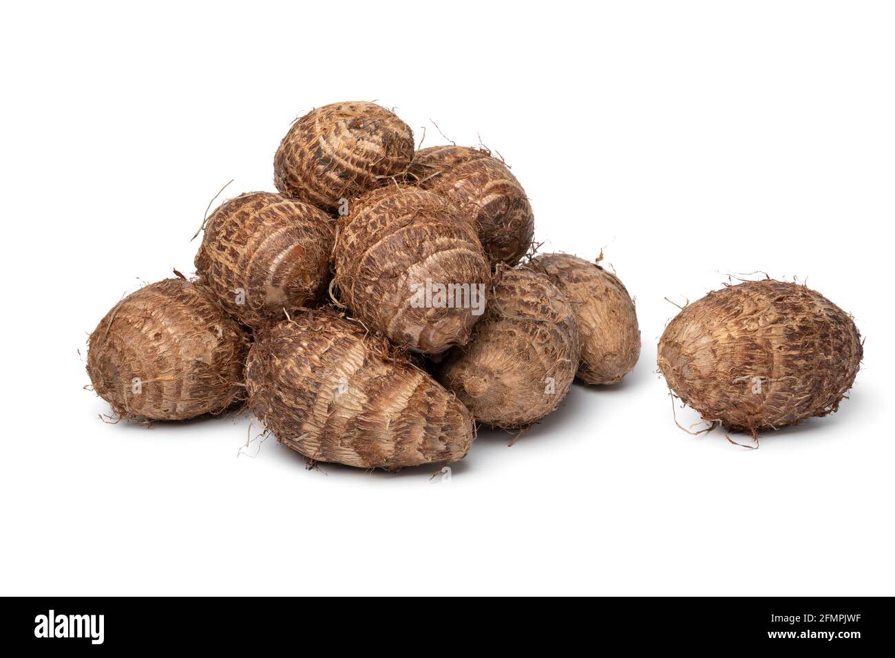 Heap of fresh whole taro vegetable isolated on white background Stock Photo