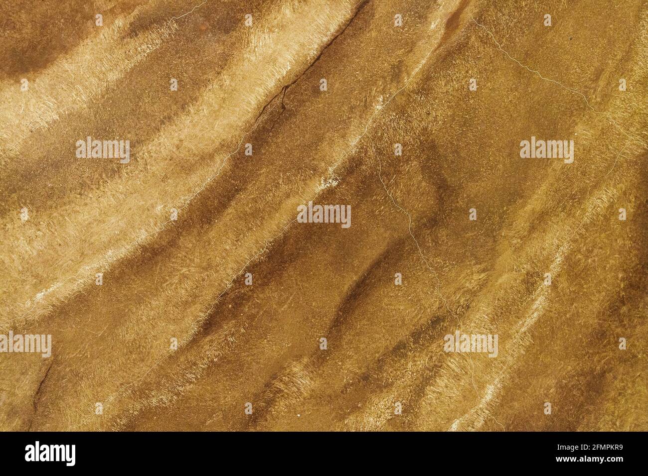 Beige artificial marble texture. Stone abstract background pattern, painted on the wall. Stock Photo