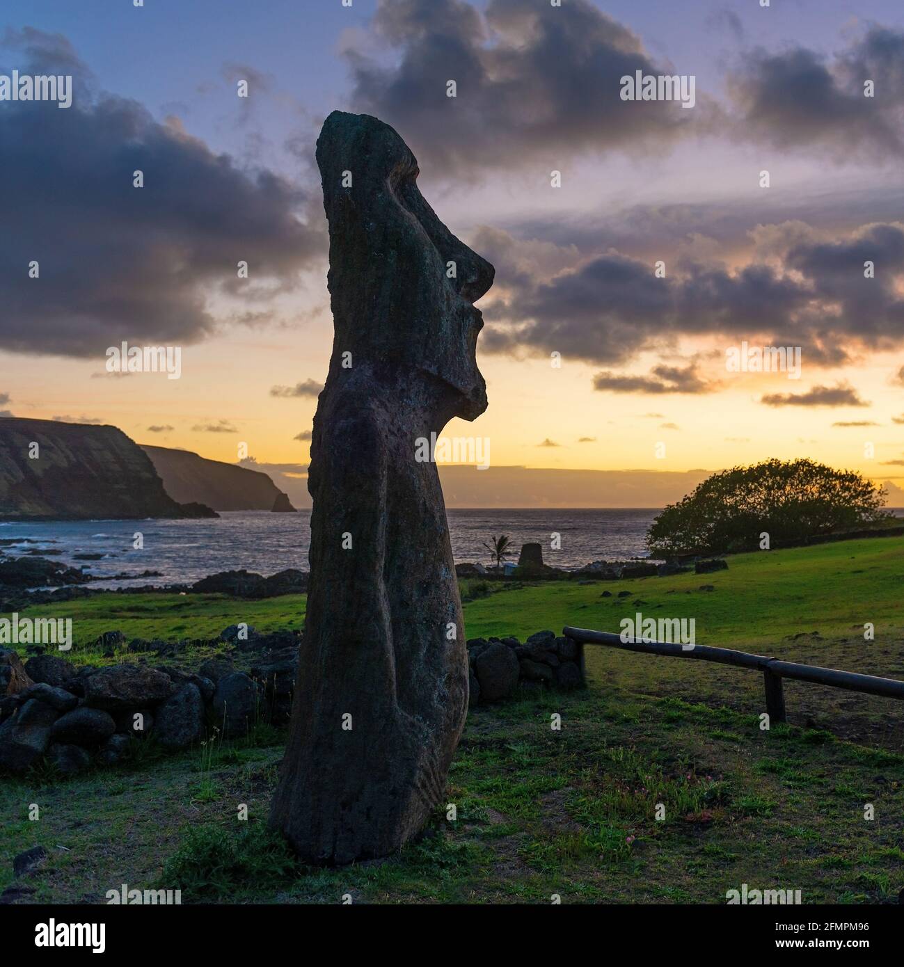 Moai at sunrise, Ahu Tongariki, Rapa Nui (Easter Island), Chile. Stock Photo