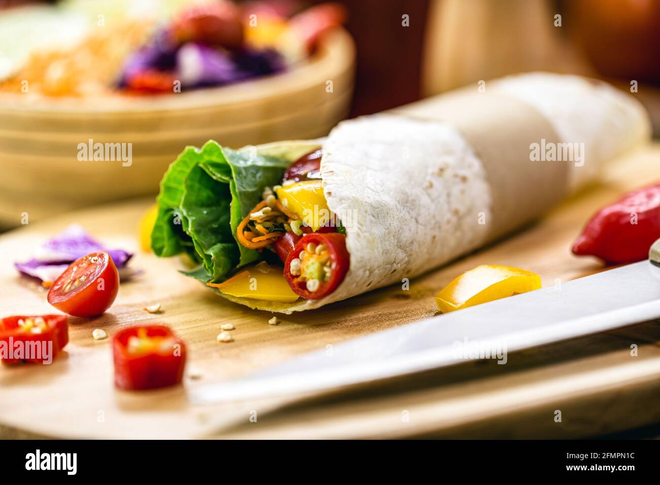 vegan wrap, made of vegetables baked in Indian bread, whole pasta without  milk, with vegetables in the background Stock Photo - Alamy