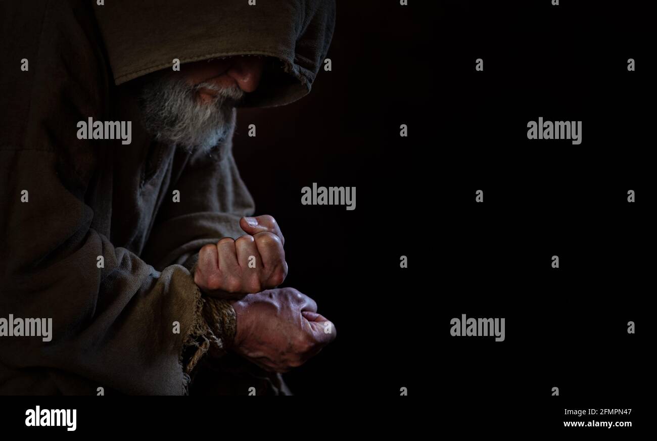 shackled beggar with middle ages Stock Photo