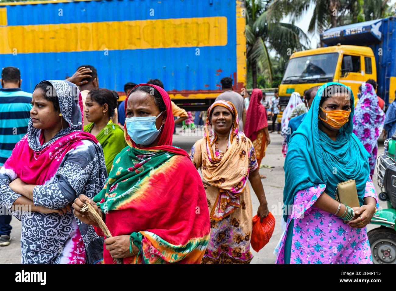 Dhaka, Bangladesh. 11th May, 2021. Garment workers of Binni Garments Ltd block the road at the factory demanding payment of due wages and Eid bonus. (Photo by Zabed Hasnain Chowdhury/SOPA Images/Sipa USA) Credit: Sipa USA/Alamy Live News Stock Photo