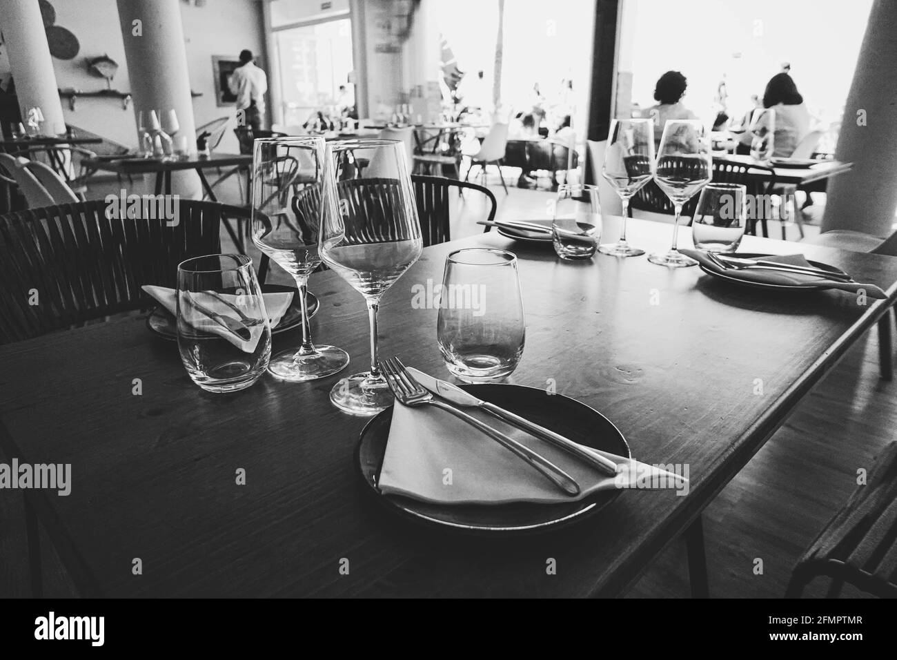 Dining table arranged and prepared for celebration Stock Photo