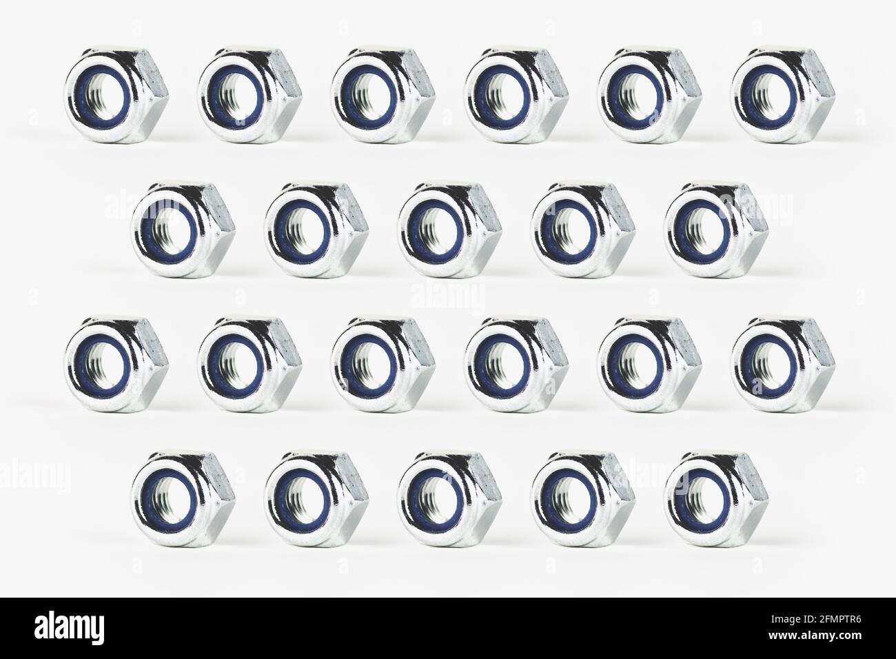 Texture and repetitive pattern of self-locking nuts, created by photo ...