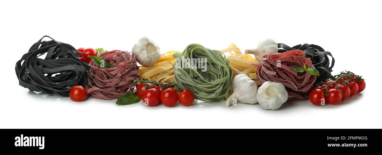 Uncooked color pasta isolated on white background Stock Photo - Alamy