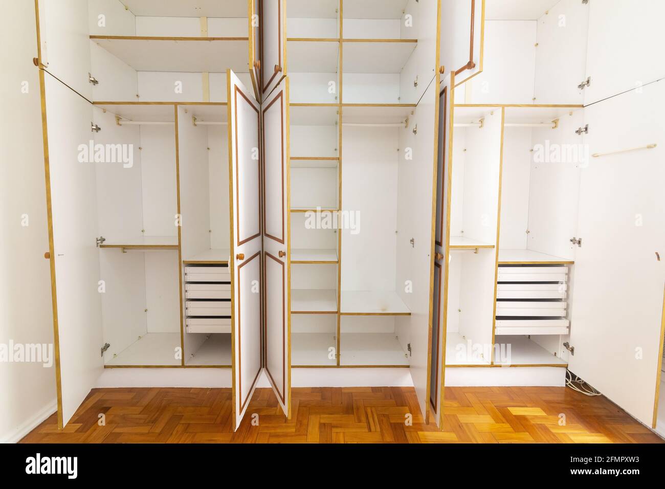 Empty white closets with open doors Stock Photo - Alamy