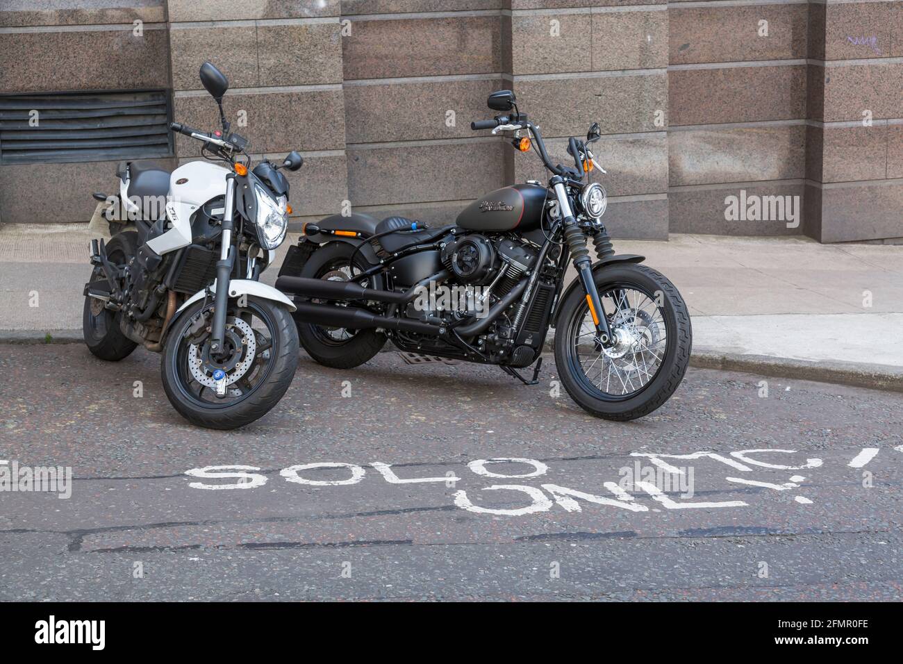 Motorbikes parked in a Solo Motorcycles Only Parking Bay, Glasgow