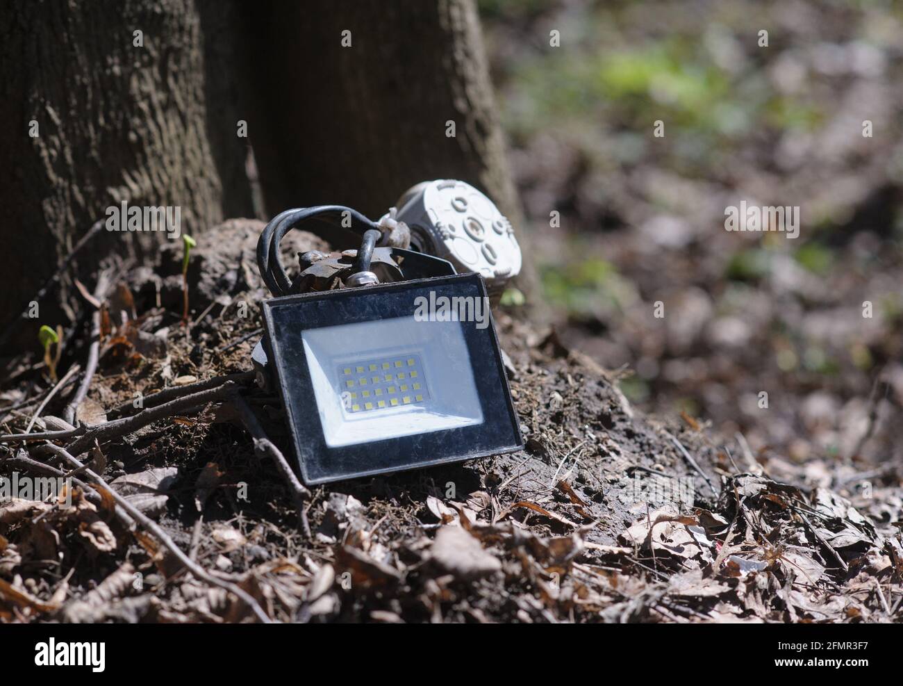 LED projector in the wild park closeup Stock Photo