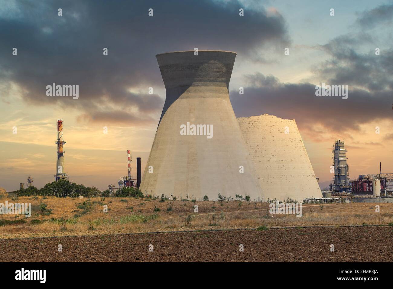 Collapsed cooling tower of the oil refinery in Haifa Israel. Stock Photo