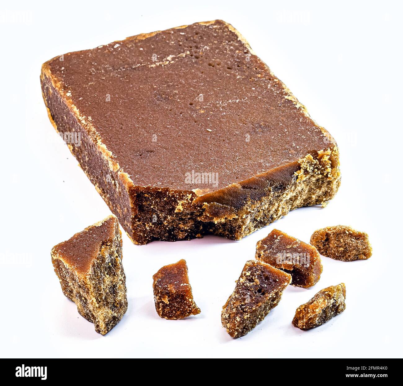 bar or tablet of rapadura candy cane and molasses isolated on