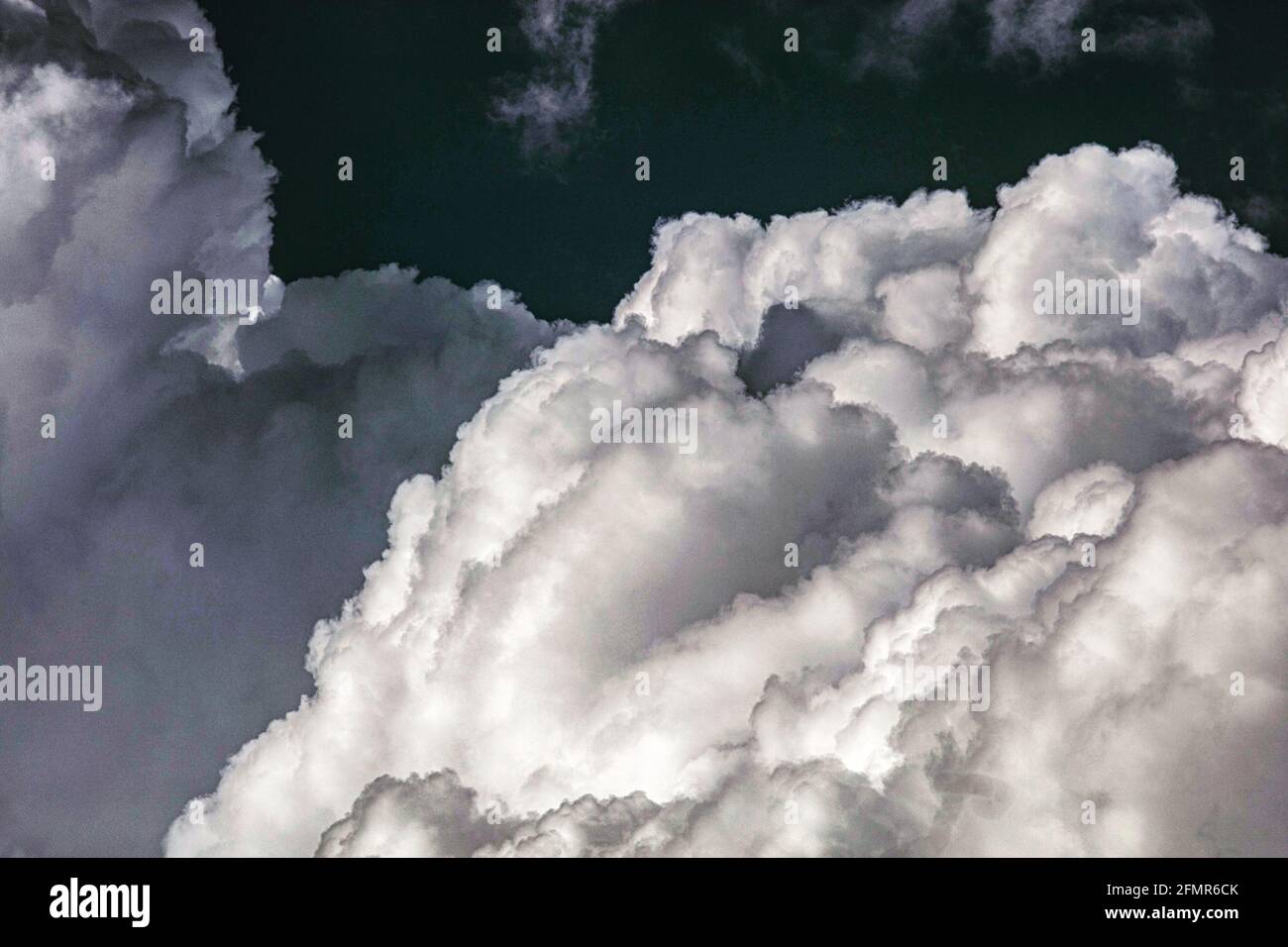 Cumulonimbus Clouds gathering before the storm Stock Photo