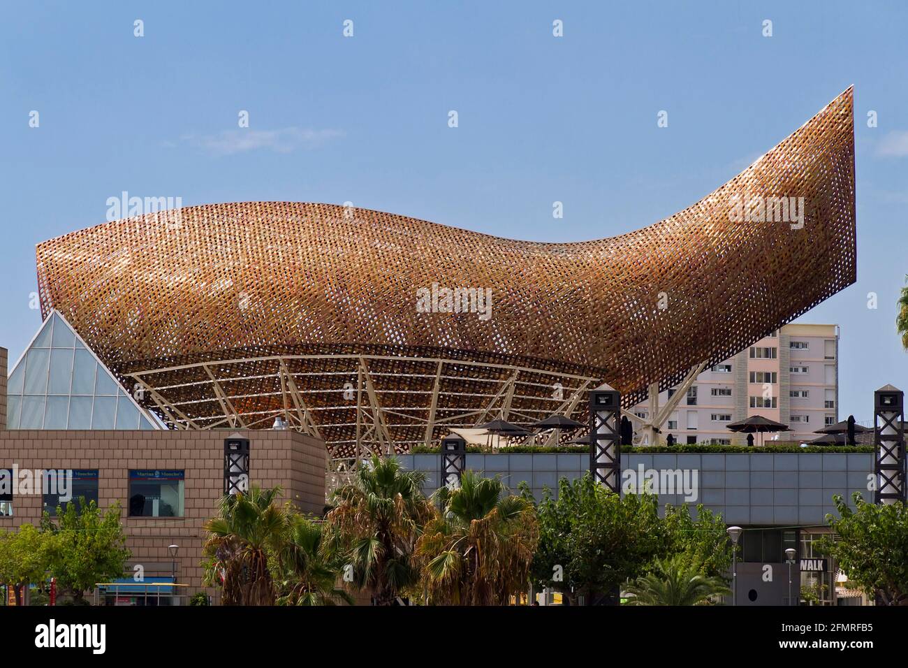 BARCELONA, SPAIN - SEPTEMBER 04: Frank Gehry modern El Peix d'Or sculpture is located in Barcelona Vila Olimpica, Olympic Village for the 1992 Olympic Stock Photo