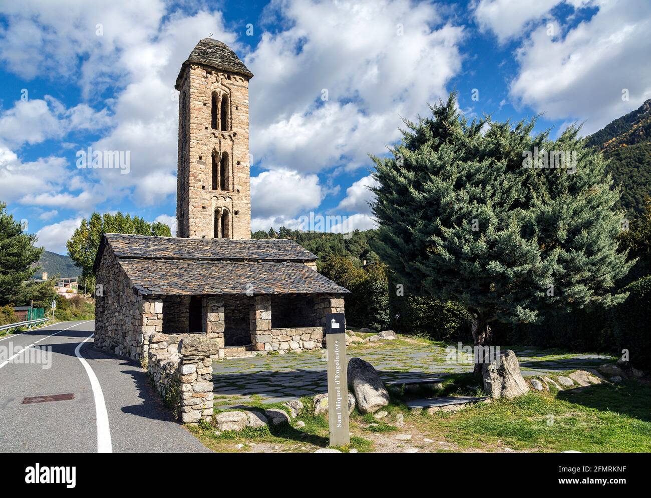 Romanesque church Sant Miquel d Engolasters whose main architectural feature is the bell tower, with stories having mullioned windows and Lombard arch Stock Photo
