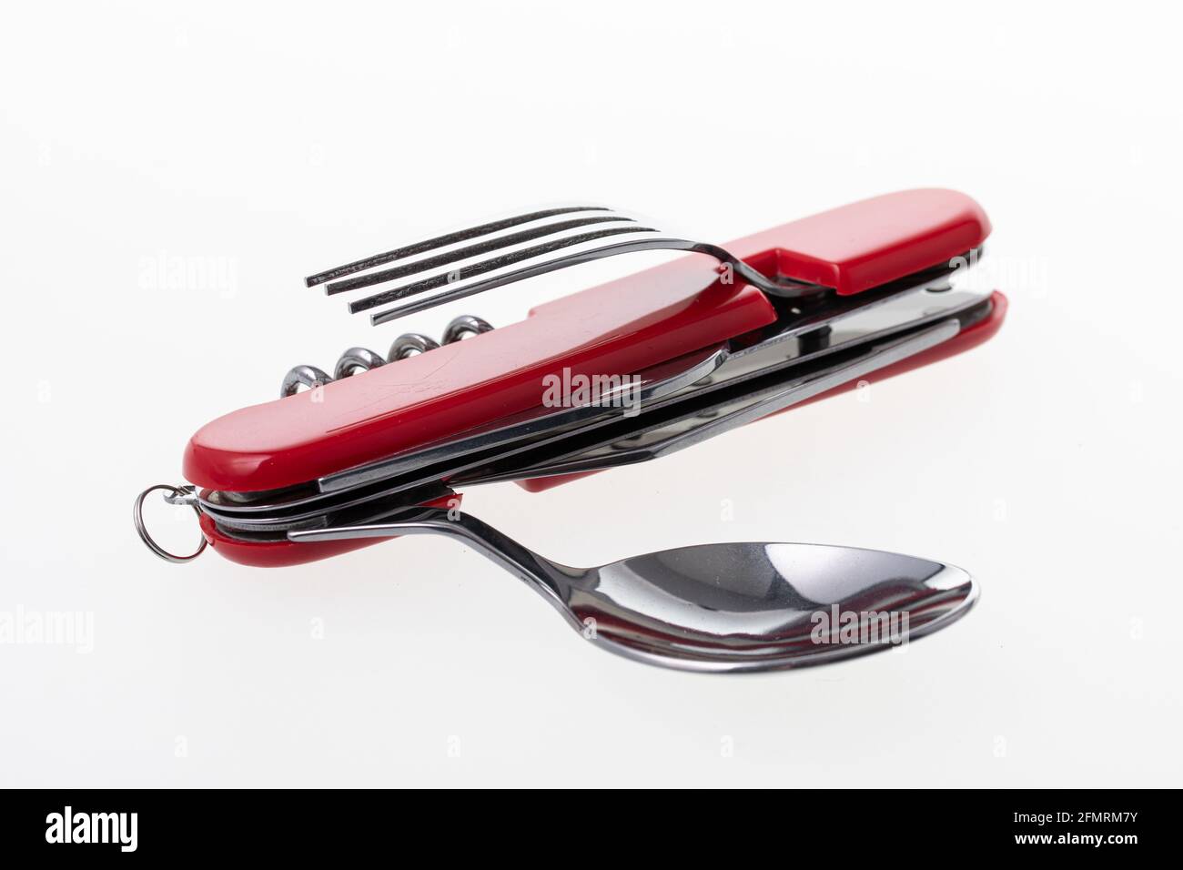 Multifunctional tool includes knife, spoon, fork, bottle opener, corkscrew Stock Photo Alamy