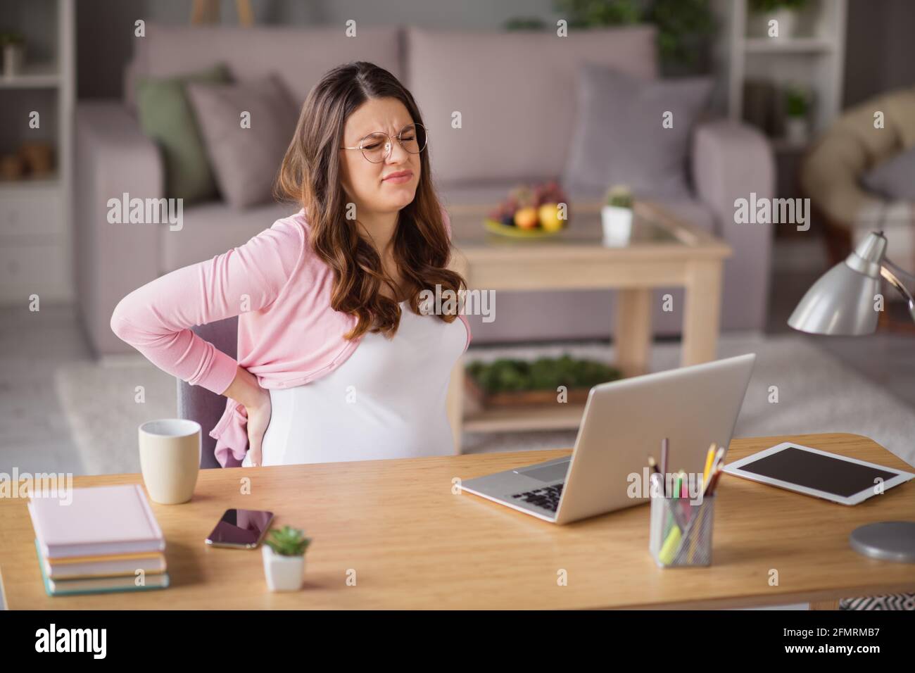 Portrait of attractive pregnant girl copywriter working remotely