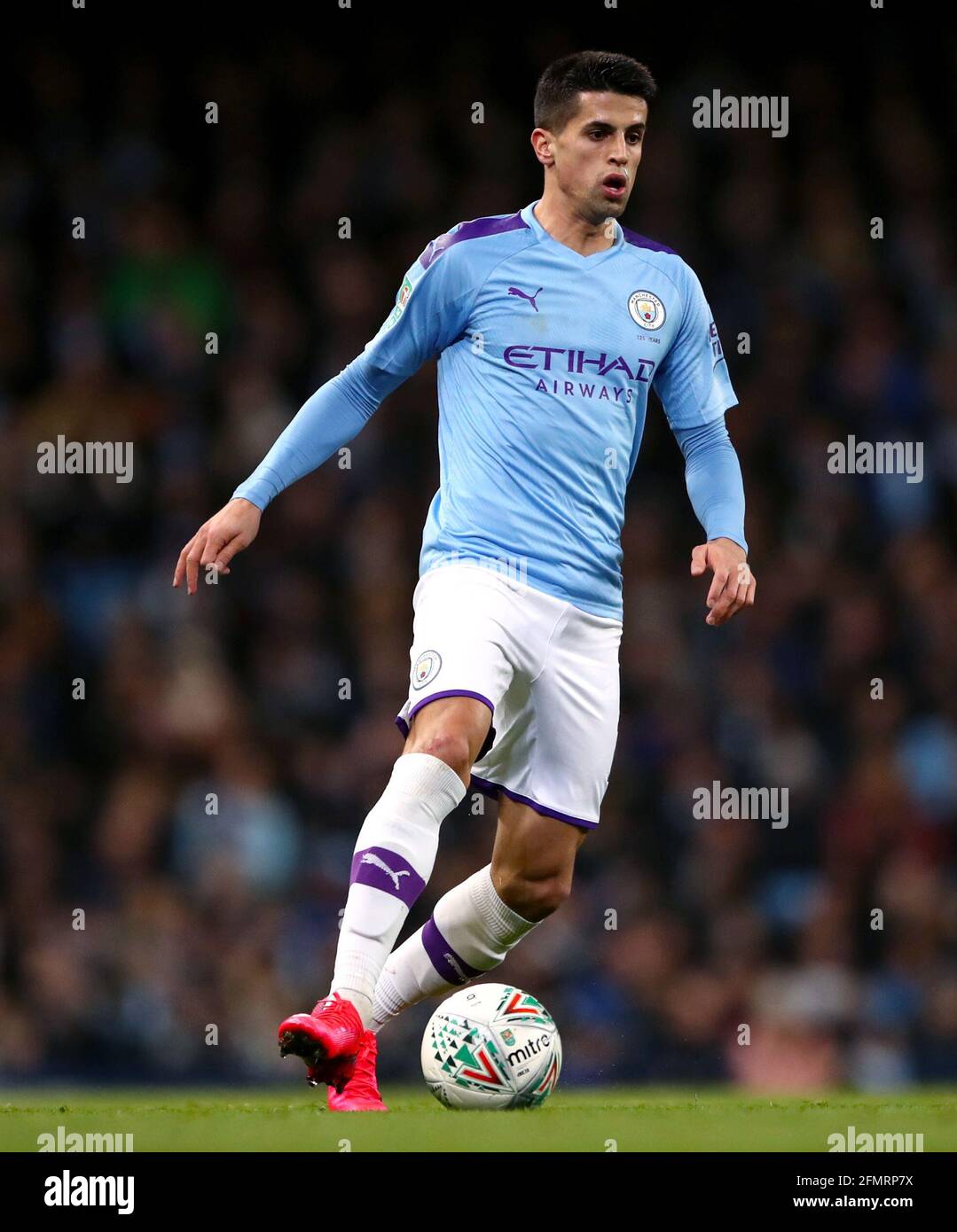 File photo dated 29-01-2020 of Manchester City's Joao Cancelo during the Carabao Cup Semi Final, second leg match at the Etihad Stadium, Manchester. Issue date: Tuesday May 11, 2021. Stock Photo