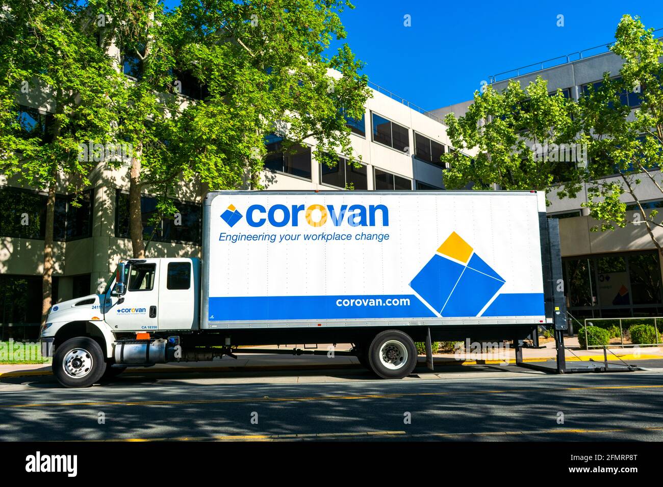 Corovan logo, sign on truck at commercial office building. Corovan is a full-service full-service commercial moving company - San Jose, California, US Stock Photo