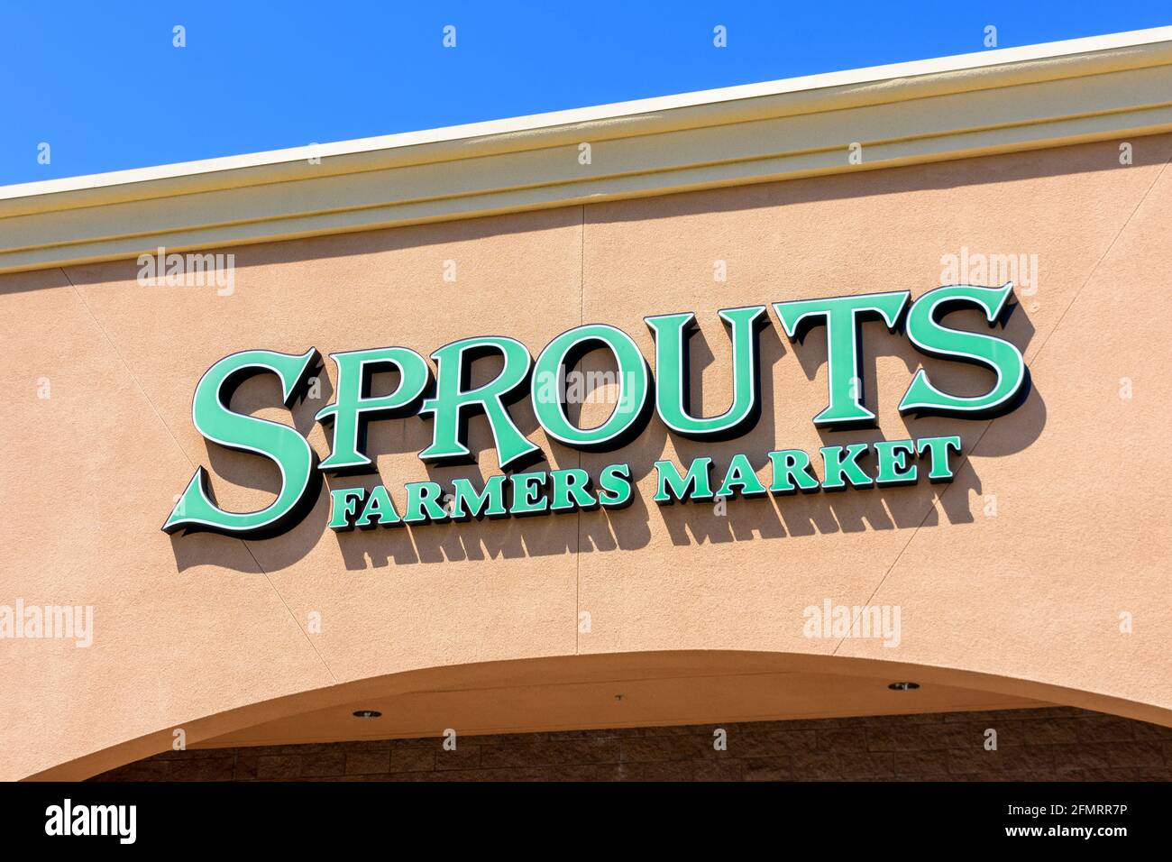Sprouts Farmers Market sign on the retail grocery store location. San