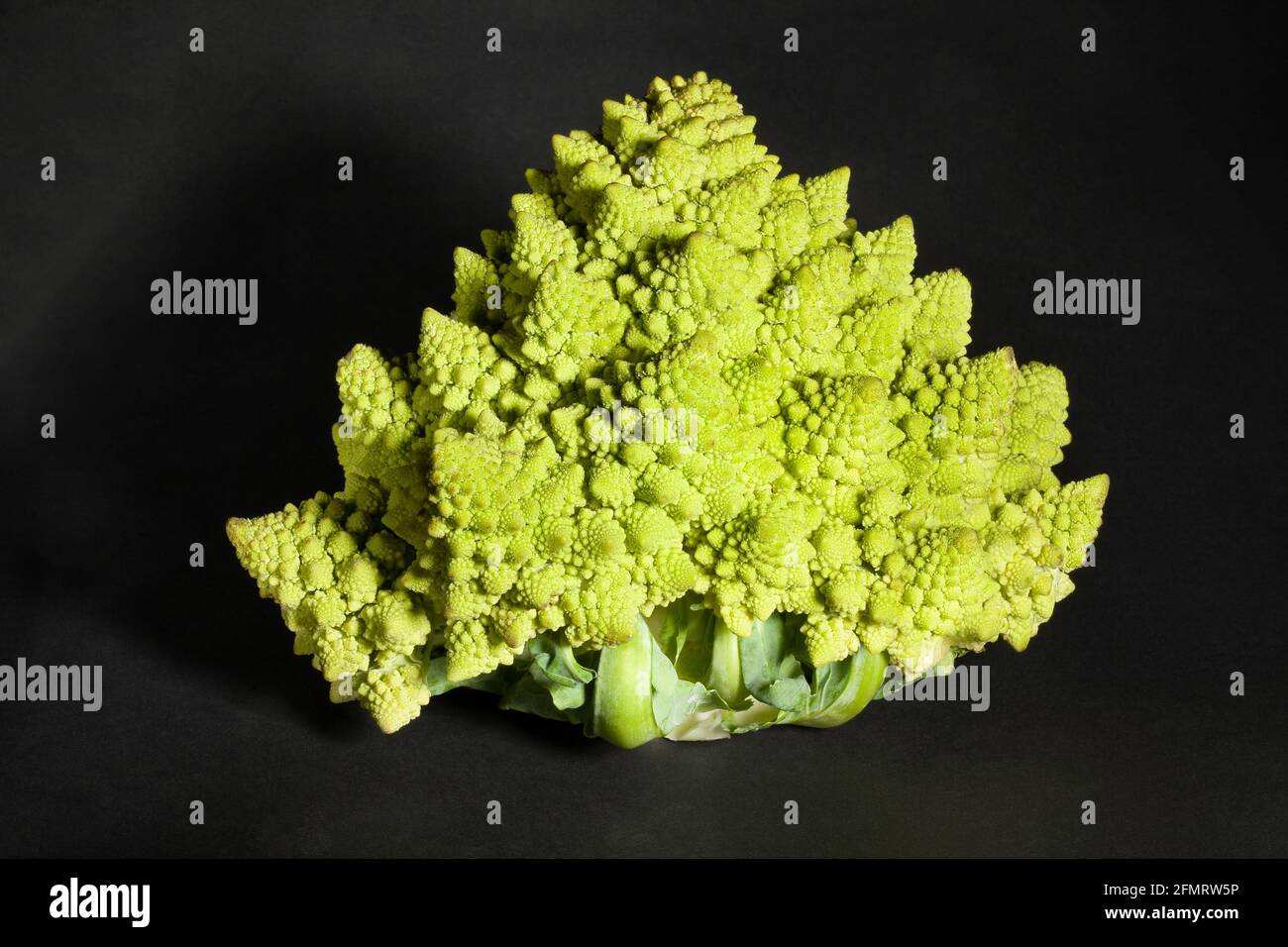 romanesco broccoli on black background Stock Photo